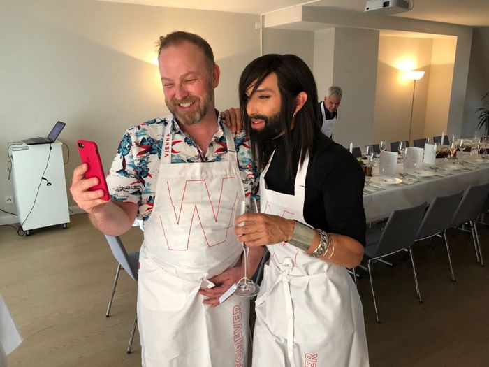 Michael Bach with Conchita Wurst, 2014 Eurovision Song Contest winner, at a private event in Vienna.